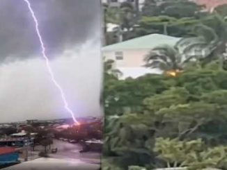 Lightning showered like bullets from the sky, nature's furious form captured in the camera