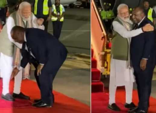 The PM of this country touched the feet of PM Modi with a hug, the video of the grand welcome went viral