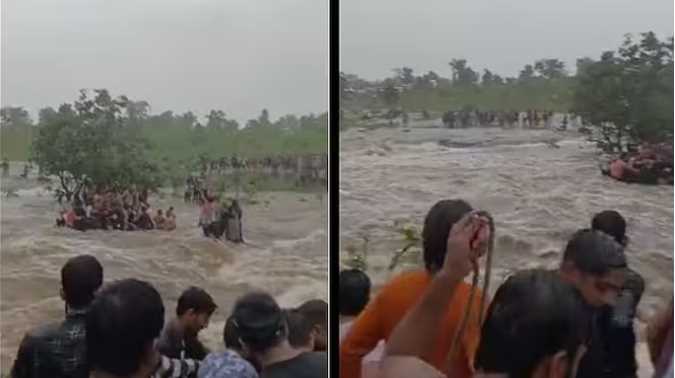 A large number of people trapped in a waterfall in Madhya Pradesh, a boy along with a bike got swept away, watch video