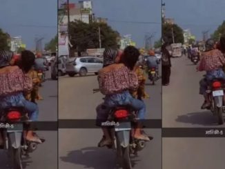 Couple kissed on moving bike, video went viral on social media
