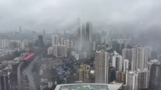 Mumbai inundated; schools closed; massive devastation—eight dead.