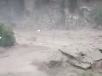 Massive devastation caused by flash floods; 10 dead, over 100 missing.