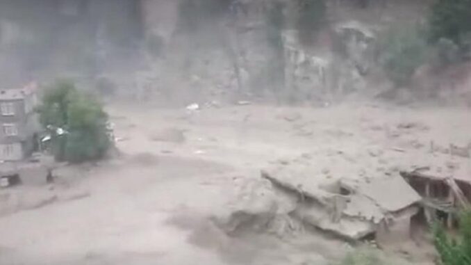 Massive devastation caused by flash floods; 10 dead, over 100 missing.