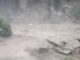 Massive devastation caused by flash floods; 10 dead, over 100 missing.