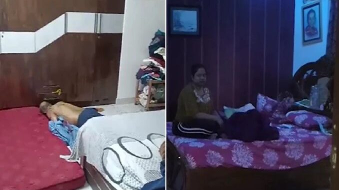 Doctor's body found at home with blood-stained son; wife discovered lying on the bed, using her mobile phone.